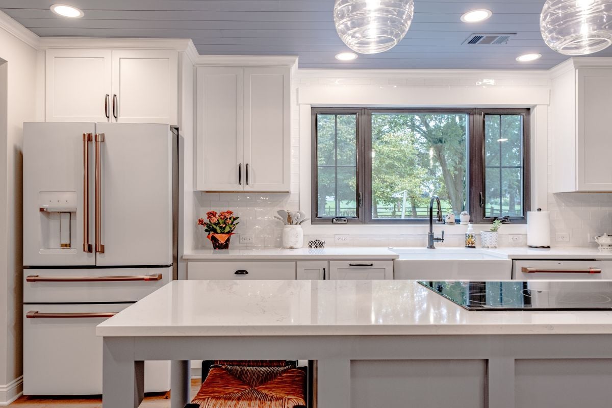 luxury kitchen remodeling project in Birchwood Neighborhood Okemos Michigan built by Custom Built Design and Remodeling with white cabinetry and quartz countertops