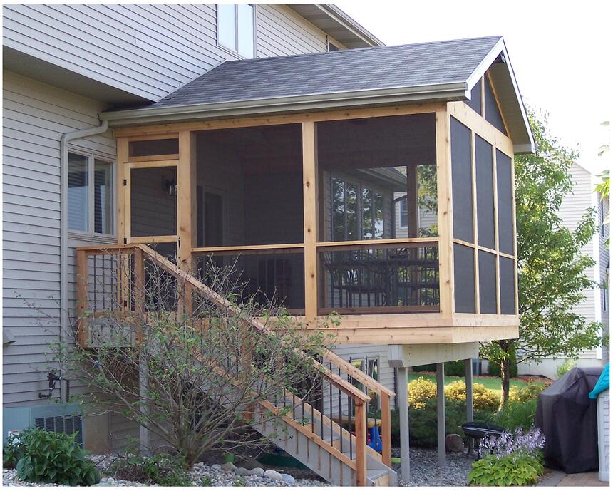 sunroom addition in Northern Michigan built by Custom Built Design and Remodeling